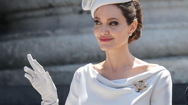 Angelina Jolies Brooch 2 - Metal Crafts Glamor: Celebrity Stars Decorate the Way They Do